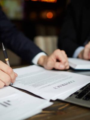 businessman-reading-contract-closeupcompresssssss