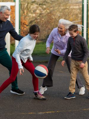 full-shot-family-playing-basketball